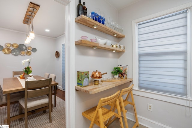 interior space featuring crown molding