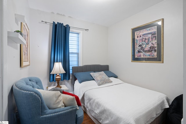 bedroom featuring wood-type flooring