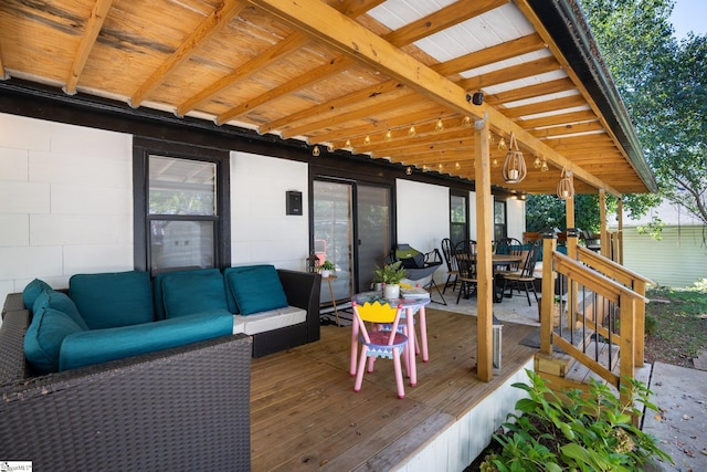 wooden deck with outdoor lounge area