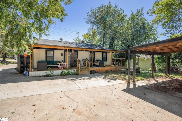 back of house with a wooden deck