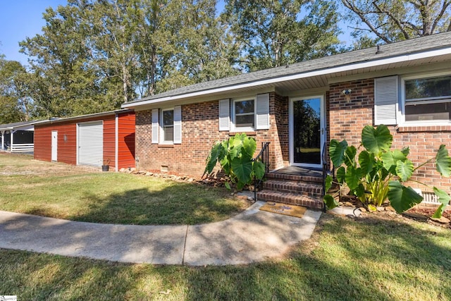 ranch-style house with a front lawn