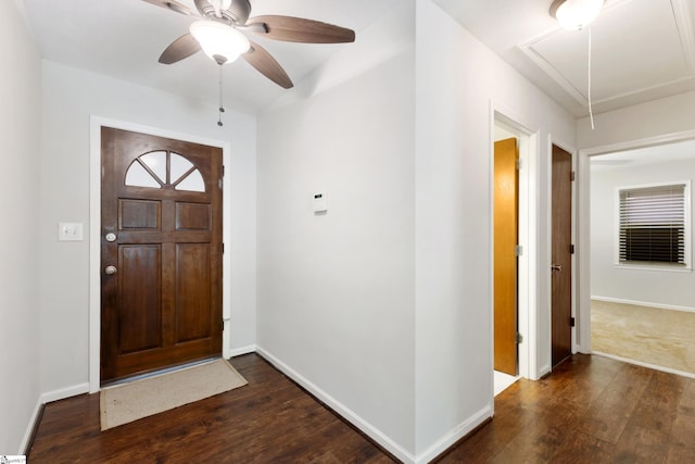 foyer featuring dark hardwood / wood-style flooring and ceiling fan