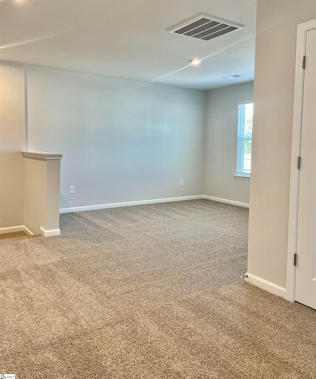 unfurnished room with carpet