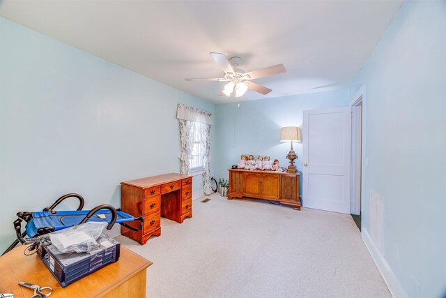 interior space with ceiling fan