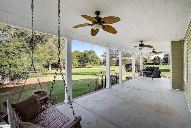 view of patio / terrace featuring ceiling fan