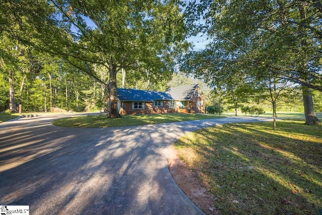 view of front of home with a front lawn