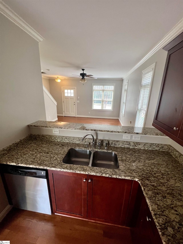 kitchen featuring ceiling fan, sink, stainless steel dishwasher, light stone countertops, and crown molding