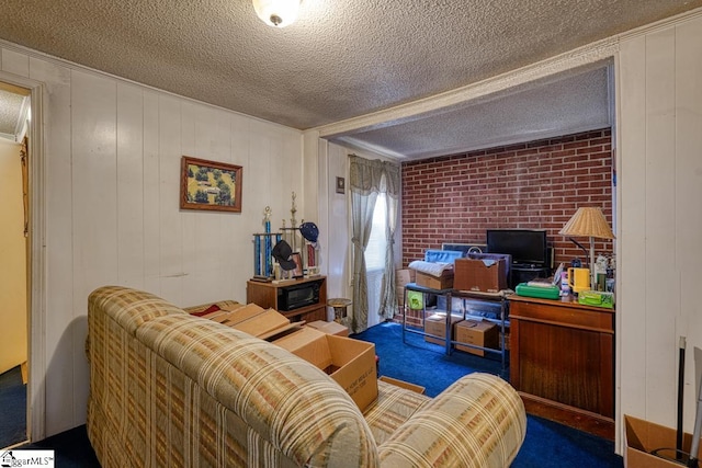 living room featuring brick wall, a textured ceiling, wood walls, and carpet flooring