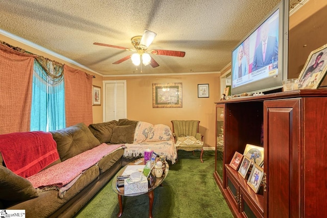 carpeted living room with ceiling fan, a textured ceiling, and ornamental molding