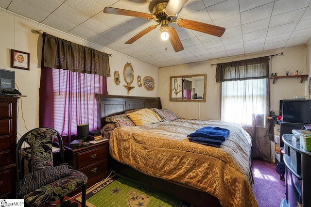 bedroom featuring carpet flooring and ceiling fan