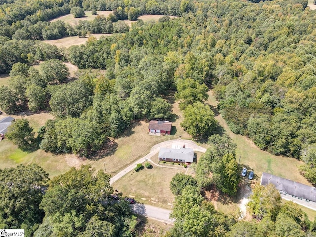 birds eye view of property with a rural view