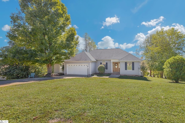 ranch-style home featuring a garage and a front lawn