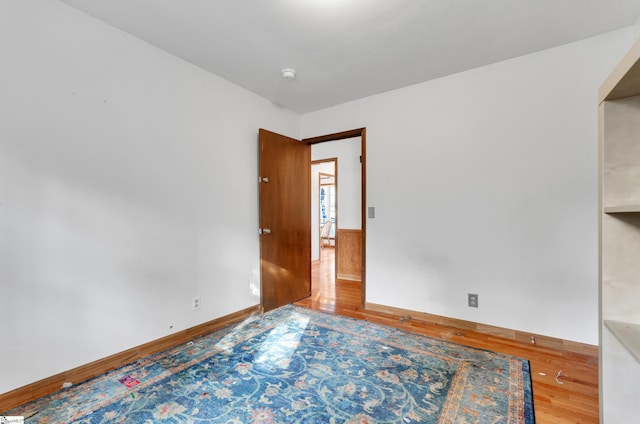 empty room featuring hardwood / wood-style floors