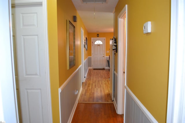 hallway featuring hardwood / wood-style floors