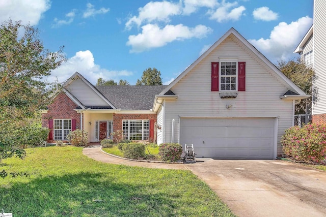 front of property with a front yard and a garage