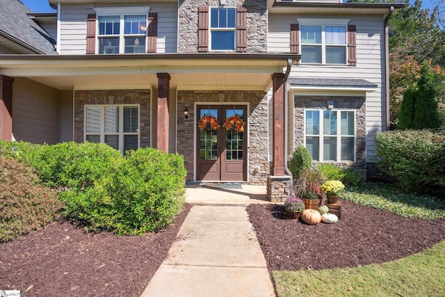 entrance to property with a porch