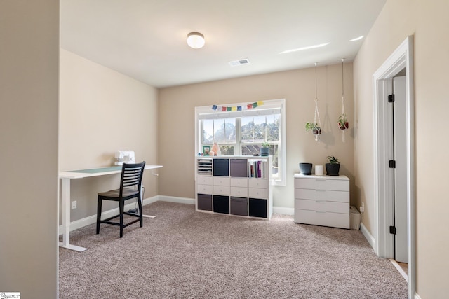 view of carpeted office space