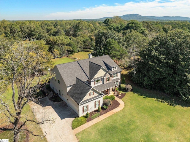 birds eye view of property featuring a mountain view