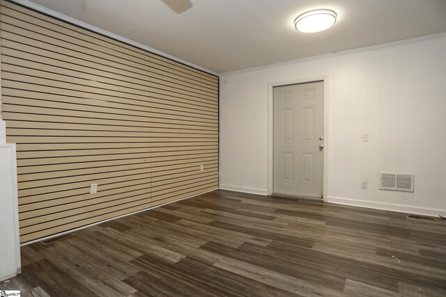 645 Woodvale Rd, Anderson, SC 29624 - spare room with visible vents, baseboards, crown molding, and dark wood-style floors