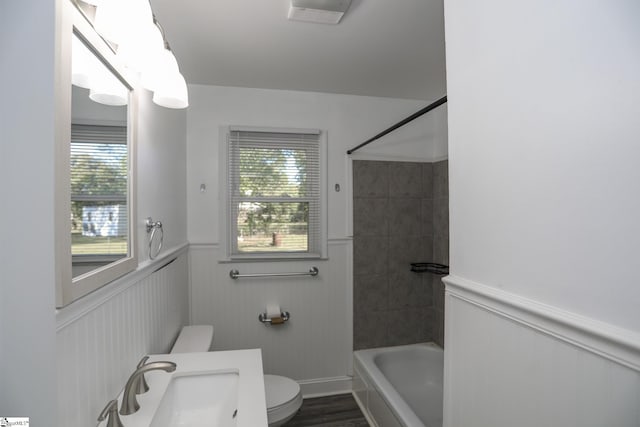 645 Woodvale Rd, Anderson, SC 29624 - bathroom featuring a sink, a wainscoted wall, a wealth of natural light, and toilet