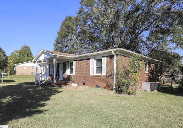 645 Woodvale Rd, Anderson, SC 29624 - view of front of house with brick siding, fence, a front yard, and cooling unit