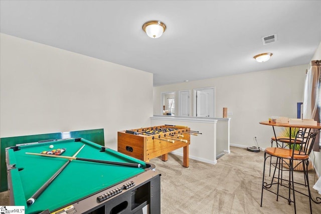 game room with light carpet