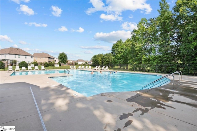 view of pool featuring a patio