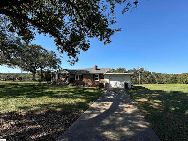 ranch-style home featuring a garage and a front lawn