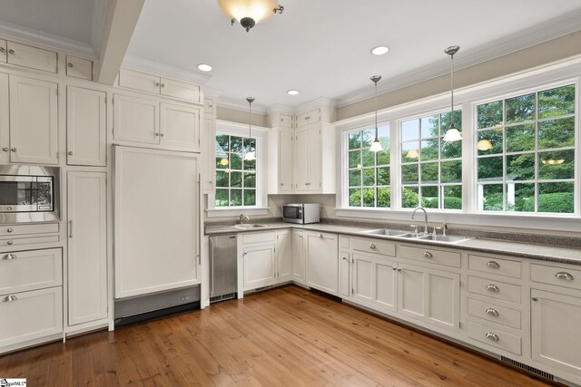 10490 New Cut Rd, Campobello, SC 29322 - kitchen featuring built in appliances, a sink, plenty of natural light, crown molding, and recessed lighting