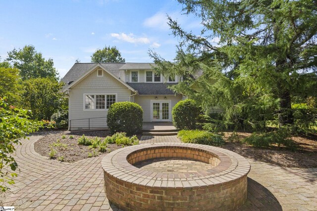10490 New Cut Rd, Campobello, SC 29322 - rear view of house with an outdoor fire pit