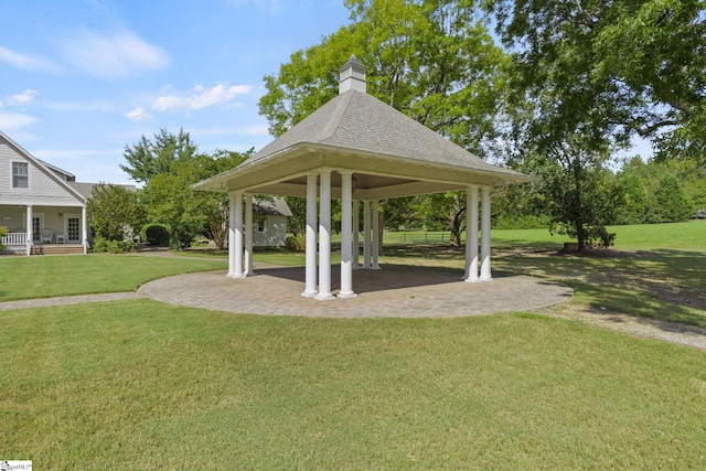 view of community with a gazebo and a yard