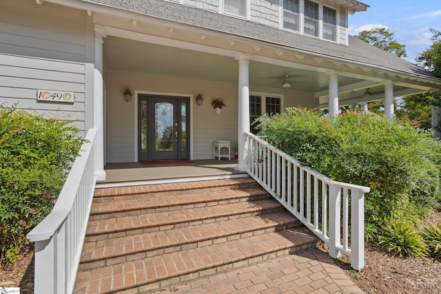 doorway to property with a porch and ceiling fan