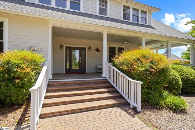 10490 New Cut Rd, Campobello, SC 29322 - doorway to property featuring a ceiling fan, covered porch, and roof with shingles