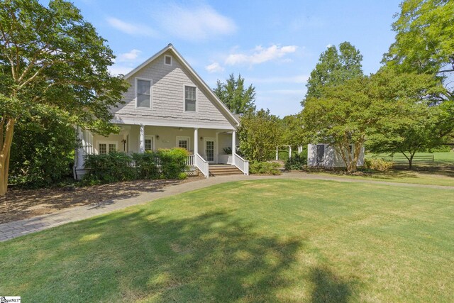 10490 New Cut Rd, Campobello, SC 29322 - view of front of home featuring a porch and a front lawn