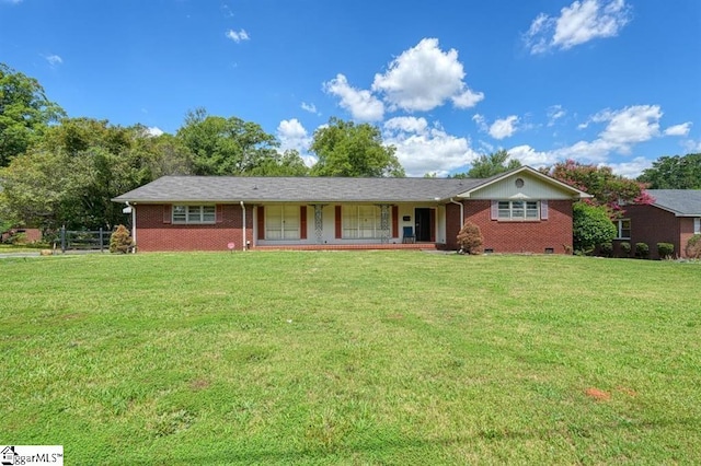 ranch-style home with a front lawn and a porch