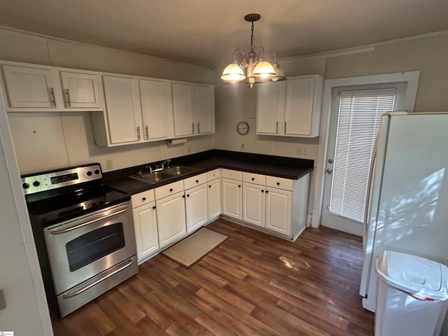 kitchen featuring white refrigerator, dark wood-type flooring, a notable chandelier, stainless steel electric range oven, and white cabinets