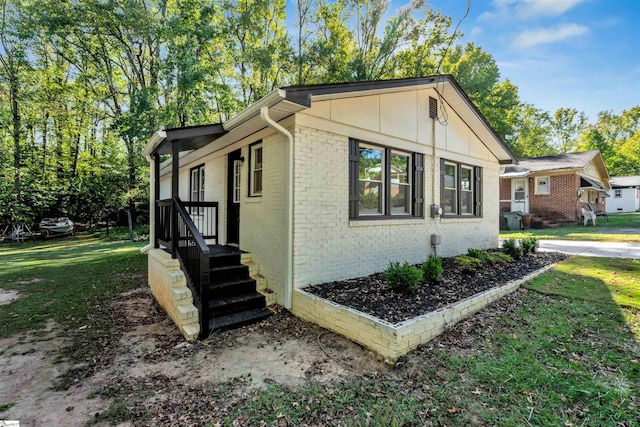 view of home's exterior featuring a yard