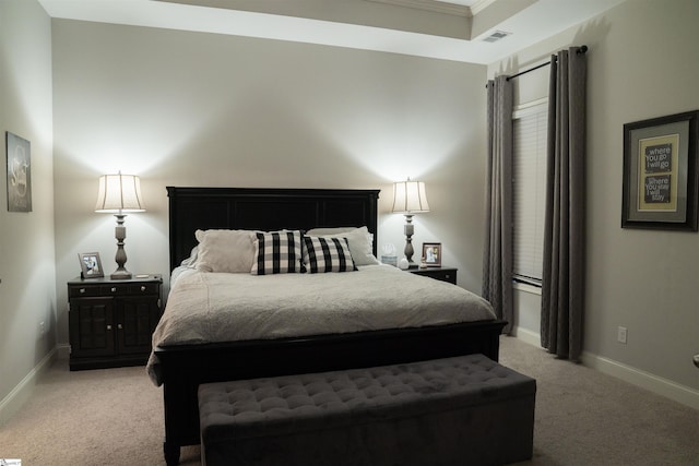 bedroom with light colored carpet