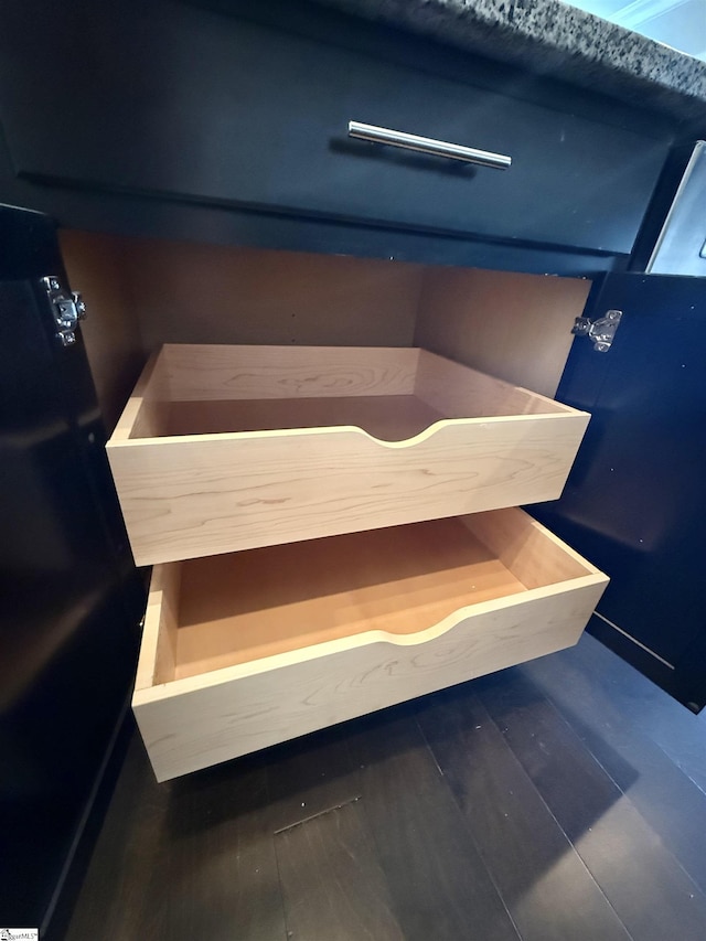 interior details featuring hardwood / wood-style flooring