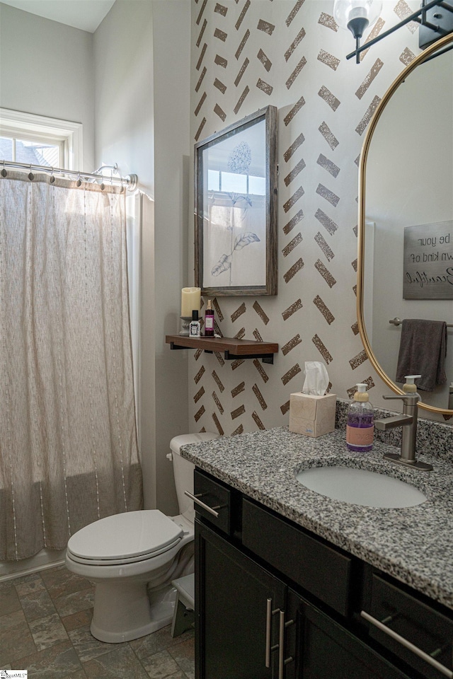 full bathroom with vanity, toilet, and shower / bathtub combination with curtain