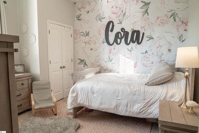 bedroom featuring radiator heating unit and a closet