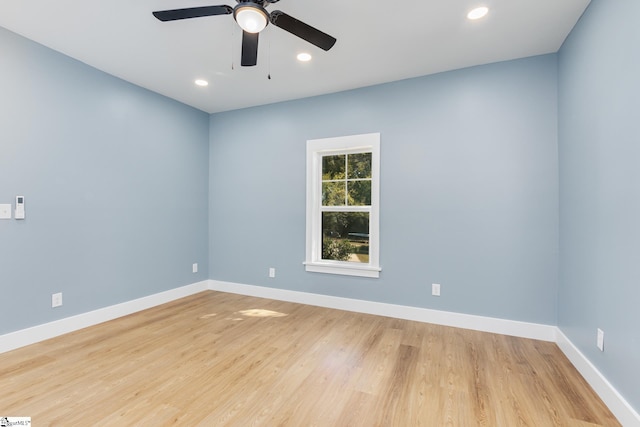 empty room featuring light hardwood / wood-style floors and ceiling fan