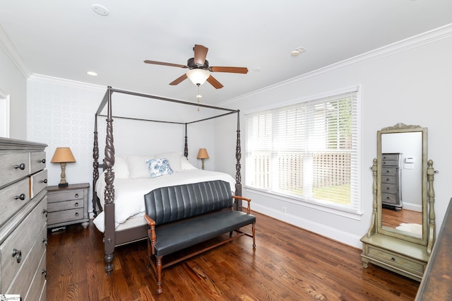 bedroom featuring crown molding, dark hardwood / wood-style floors, and ceiling fan