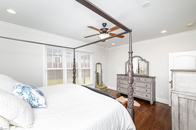 bedroom with crown molding, dark wood-type flooring, and ceiling fan