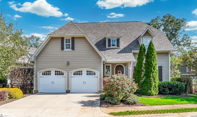 view of front of property with a garage