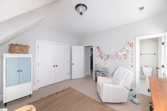 living area featuring vaulted ceiling and light carpet