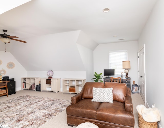 living room featuring lofted ceiling, carpet, and ceiling fan