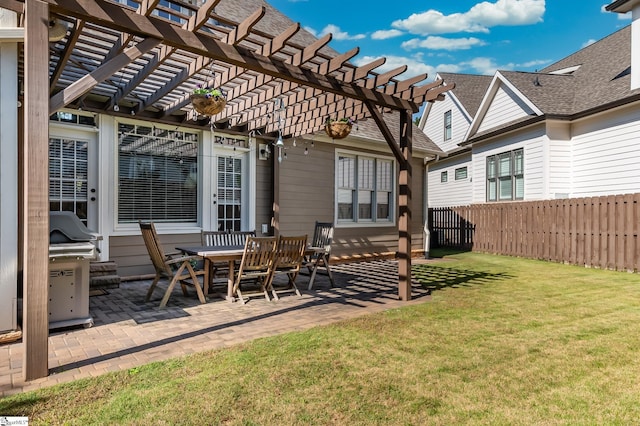 exterior space with a patio area, a yard, and a pergola