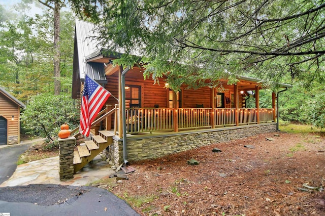 316 Hemlock Trl, Cleveland, SC 29635 - view of front facade with a porch and log veneer siding