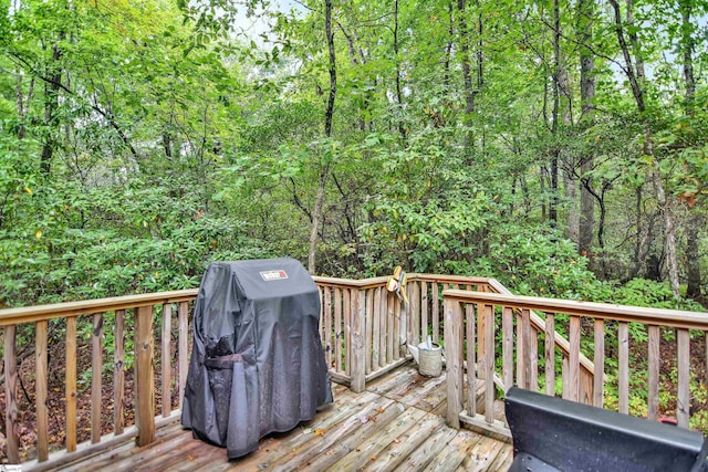 wooden deck featuring grilling area